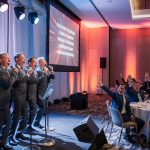 business singing party success